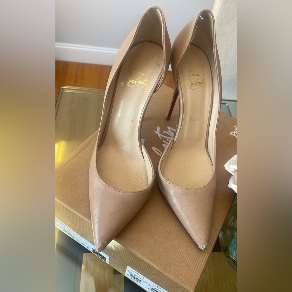 Very worn Christian louboutin nude stilettos